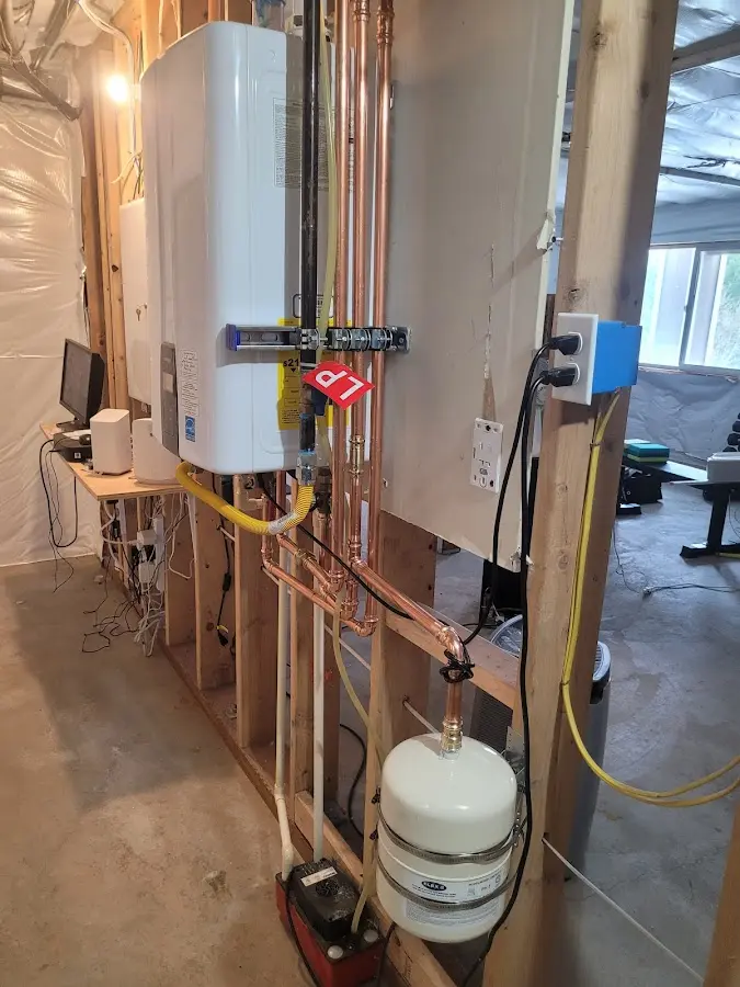 Licensed plumber repairing a kitchen sink in Kihei